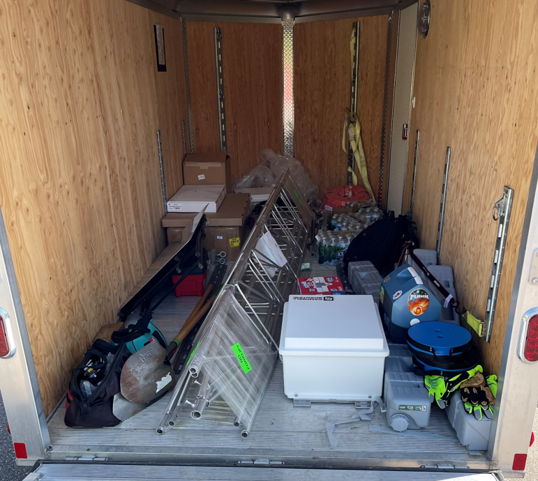 Photo of the inside of an enclosed trailer, packed with equipment for Delano mesonet.